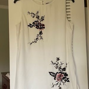 White shell with exquisite floral detail